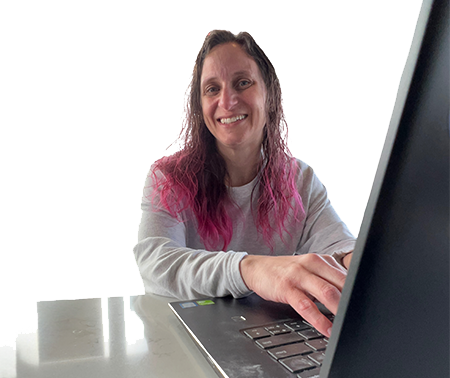 jaime at computer - facing camera close crop